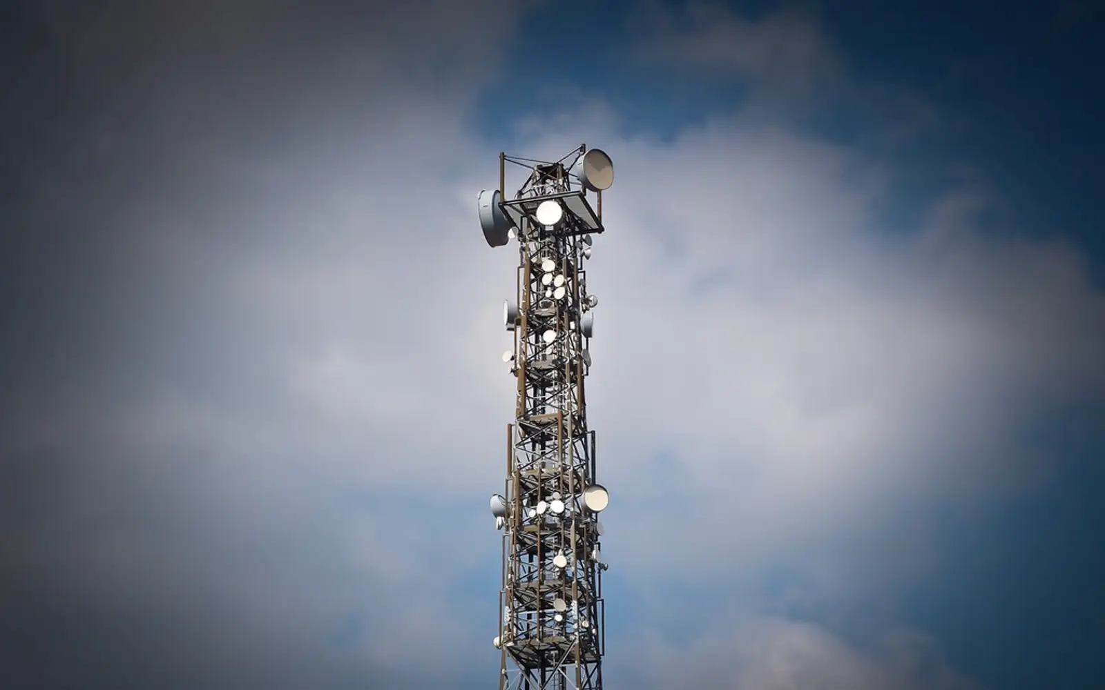 Telecommunications tower representing Exctel's global reach across six countries