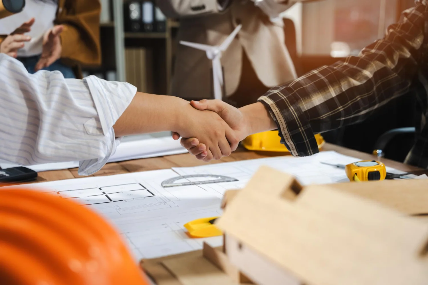 Project partners confirming after-sales support following a successful handover
